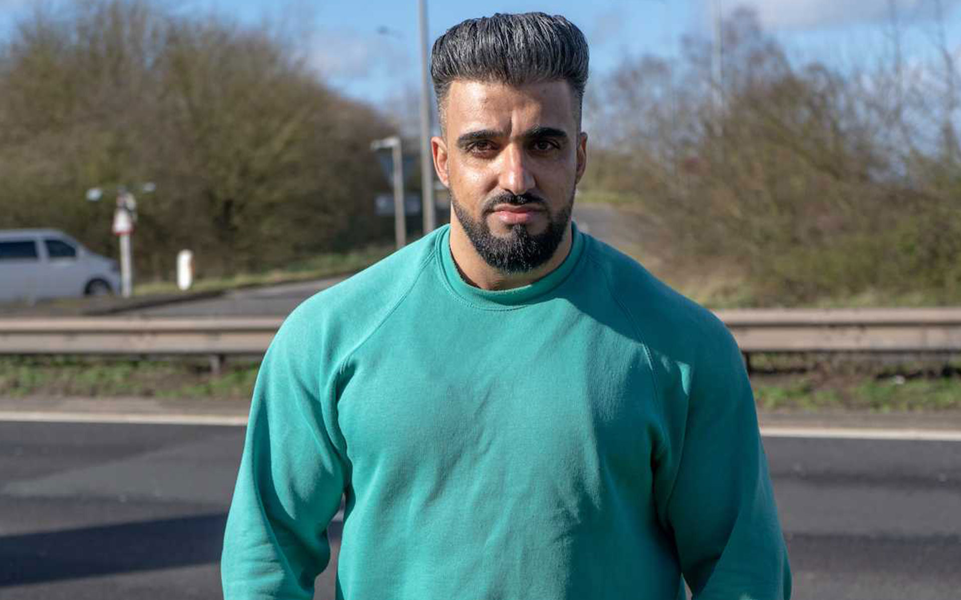 Motorist ran across a dual carriageway to rescue six people from a burning camper van before it exploded. Gym owner Akam had stopped at a petrol station on the A38 in Fradley when he heard a loud bang. He ran to investigate and saw a camper van on its side in the aftermath of a crash on the slip-road. The father-of-one dodged through oncoming traffic and ran across the dual carriageway. As he approached the vehicle, Akam was irritated to see people standing around with their phones out, filming as it started to catch fire. Akam broke open the back doors of the camper but luggage and equipment was blocking the way. Instead, he jumped onto the side of the vehicle, and started pulling the six occupants out through a window. He managed to get the sixth person out safely moments before a gas canister on board exploded. Akam said: “The reason I didn’t give up was because many years ago I lost a cousin when his car got burned and I just thought that if someone had been there like I had, he could have been saved.” Chief superintendent Jeff Moore praised Akam for risking his own life to save others. He said: “Your involvement prevented the matter being much worse and ensured those involved suffered only minor injuries.”